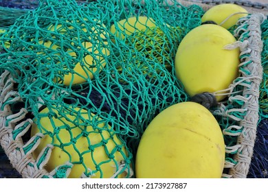yellow buoys and fishing nets