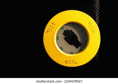 Yellow Button To Open The Front Door Of Public Transport. Yellow Button With Hand On Side Of Bus