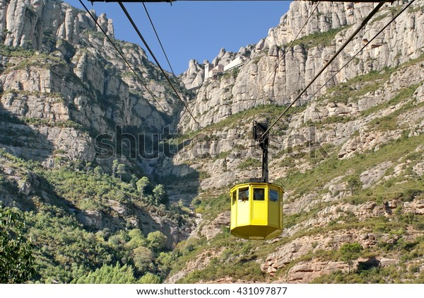 Yellow cable car
in the Aeri de Montserrat leading to the Santa Maria de Montserrat
Abbey near Barcelona,
Spain