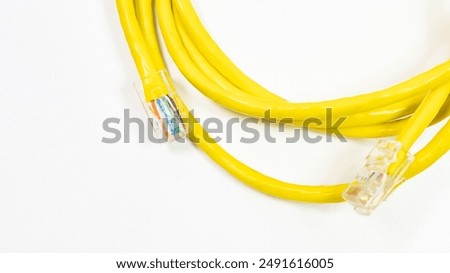 A yellow cable with a white background