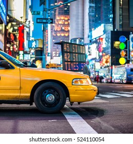 Yellow cabs in Manhattan, NYC. The taxicabs of New York City at night Time Square. - Shutterstock ID 524110054