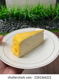 Yellow Cake Slice On A White Plate