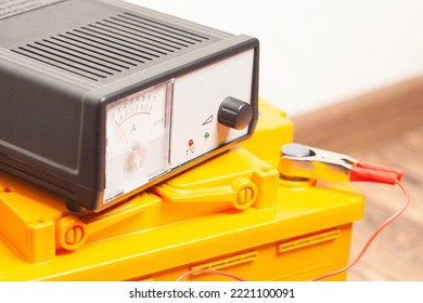 Yellow Car Battery With Car Battery Charger