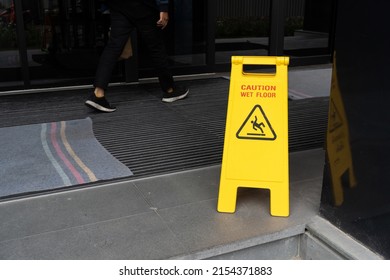 Yellow Caution slippery wet