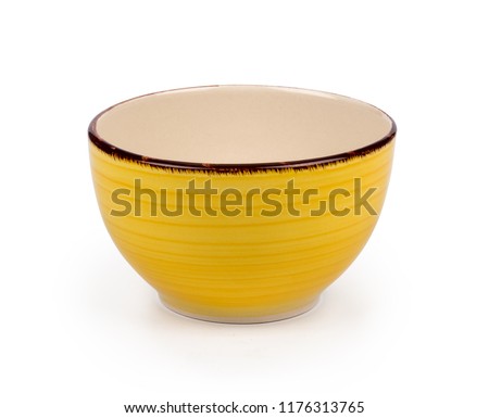 Yellow ceramic bowl isolated on white background