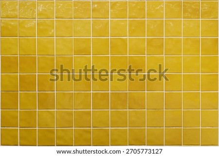Yellow ceramic tile background. Old vintage ceramic tiles in green to decorate the kitchen or bathroom 