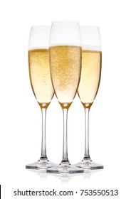 Yellow champagne glasses with bubbles isolated on white background
