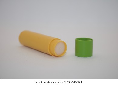 Yellow Chapstick With Green Lid