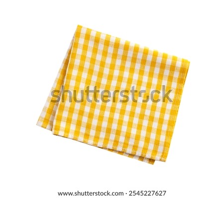Yellow checkered folded square tablecloth, gingham cloth, food decor element isolated. Kitchen towel.