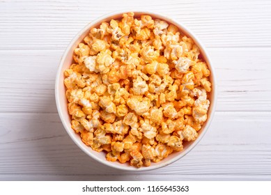 Yellow Cheese Popcorn In Bowl . Snack For Cinema