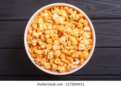 Yellow Cheese Popcorn In Bowl . Snack For Cinema