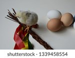 yellow chicken with Easter eggs on white background isolated 