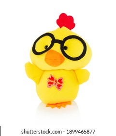 Yellow Chicken Plushie Doll Isolated On White Background With Shadow Reflection. Plush Stuffed Puppet On White Backdrop. Fluffy Rooster Toy With Glasses For Children. Cute Furry Plaything For Kids.