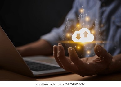 Yellow Cloud Computing Technology or Cloud Storage Network Concept. Cloud Icon and Circuit Line on Business's Hand with Laptop Computer