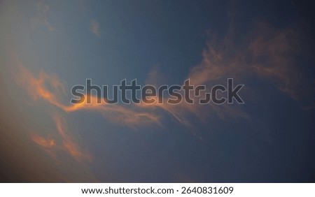 Yellow clouds in the afternoon with a unique shape like fire, in the clear afternoon sky
