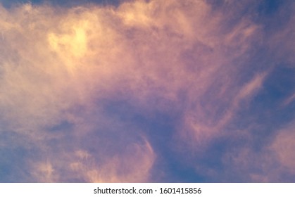 Yellow clouds in the blue sky - Shutterstock ID 1601415856