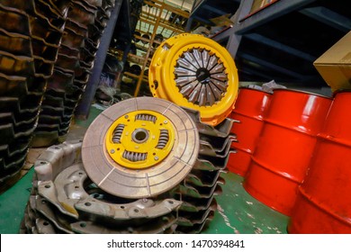 The yellow clutch is placed on the metal.  - Shutterstock ID 1470394841