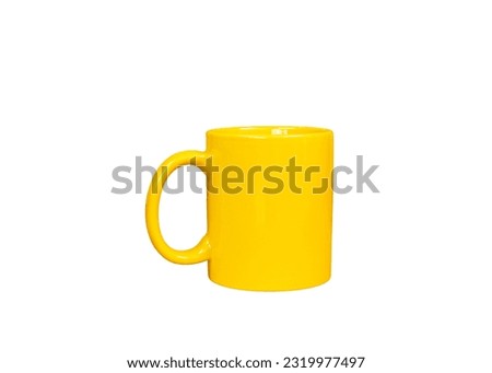 Yellow coffee mug isolated on a white background