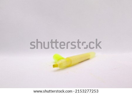 yellow colored maker uses to mark important parts in the book
