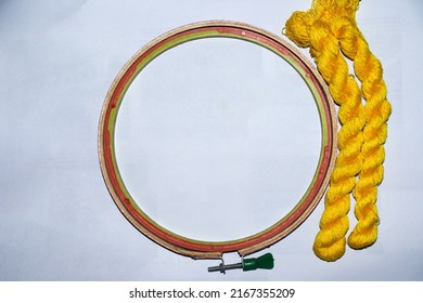 Yellow Colored Wool Yarn Bunch With Hand Wood Circle Frame For Embroidery