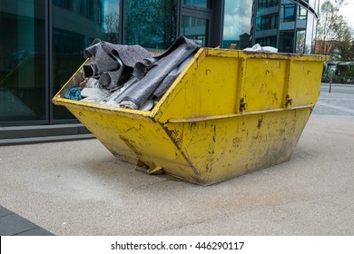 Yellow Container With Construction Waste For Disposal