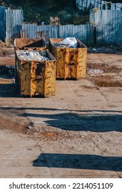 Yellow Containers Full Of Scrap Metal 