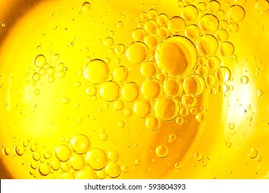 Yellow Cooking Oil Bubble On Water. 