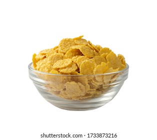 Yellow Corn Cereal For Breakfast In Round Glass Bowl Isolated On White Background. Pile Of Crispy Corn Flakes, Cornflakes Or Cereals Side View