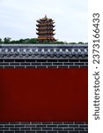 Yellow Crane Tower and traditional Chinese red wall in Wuhan, China