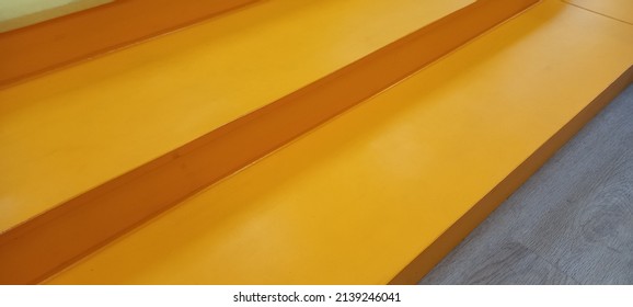 Yellow cubes forming steps or stairs, minimal career, success or growth concept