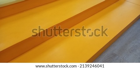 Yellow cubes forming steps or stairs, minimal career, success or growth concept