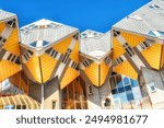 Yellow cubic houses in Rotterdam, The Netherlands. The "kubuswoningen" in Rotterdam are a tourist attraction.