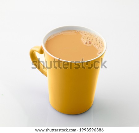 yellow cup isolated on a white background selective focus