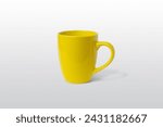 Yellow cup on gray surface for logo branding mockup