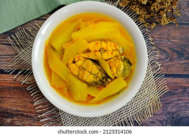 Yellow curry with fresh papaya and Sea bass. Authentic Thai southern spicy and sour yellow curry.