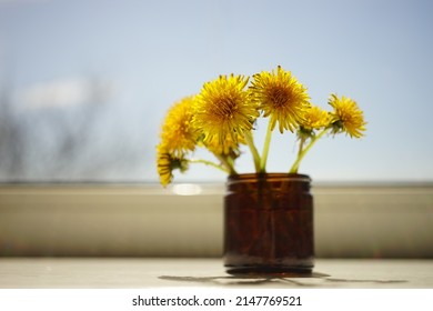 Yellow Dandelion Flowers Bouquet On Sunny Windowsill.