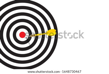 Yellow dart  almost hit the bulleye and missed the target and hit on the white space on the targer bacground,, Almost there Keep Going Idea and Missed Target Concept