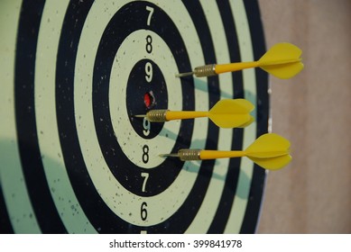 Yellow darts missing target