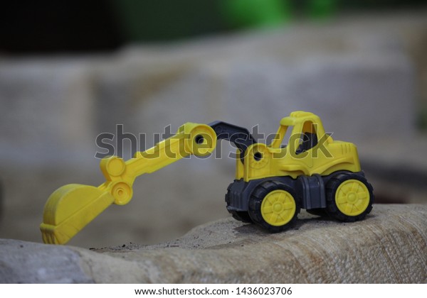 yellow digger toy