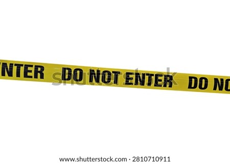 Yellow Do Not Enter barricade tape isolated on white background.