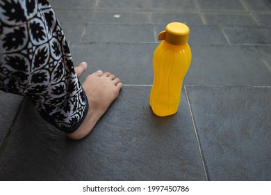 Yellow Drink Holder On The Floor