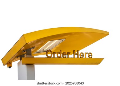 Yellow drive through resturant light and sign saying Order Here - isolated on white and room for copy