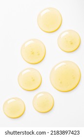 Yellow drops of gel close up. Cosmetic product for moisturizing the skin of the face or body.