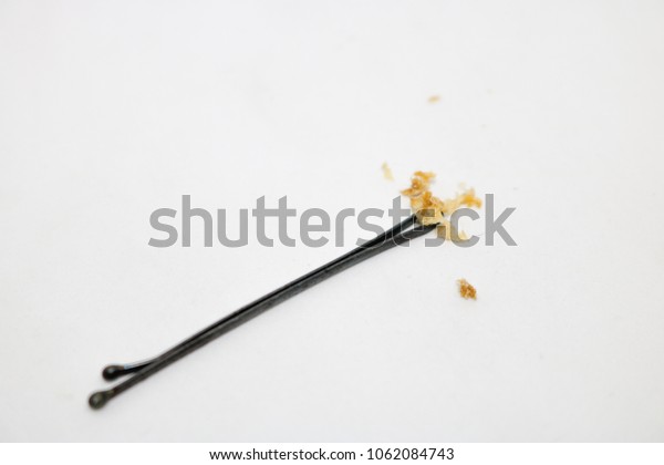 Yellow Dry Ear Wax Black Hair Stock Photo Edit Now 1062084743