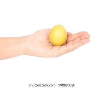 yellow easter egg in hand on white background