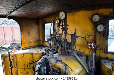 Yellow Engine Room On The Steam Locomotive