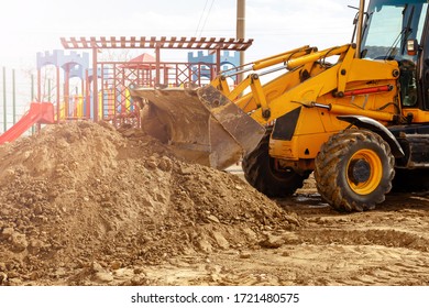 Yellow excavator. Digger machine removing earth in construction site