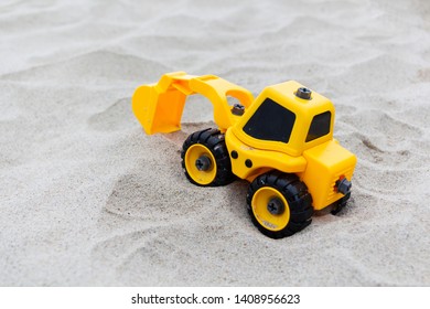 yellow digger toy