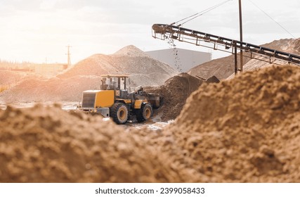 Yellow Excavator working on sand industrial quarry. Construction site industry banner concept.