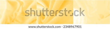 Yellow fabric. Abstract background with luxury fabric or liquid silk texture. Waves or wavy pleats create an elegant design Can be used as background or wallpaper Made from high quality silk material